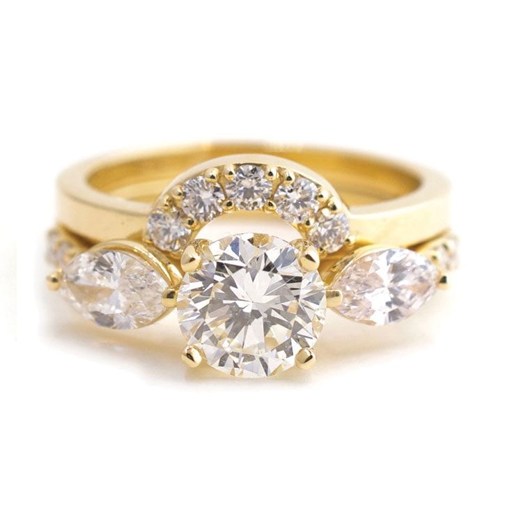 A custom yellow gold diamond wedding ring flush set. The Amelia set by Abby Sparks Jewelry