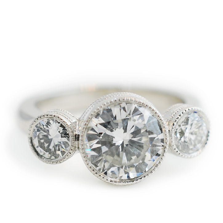 Round Diamond Three Stone Engagement Ring