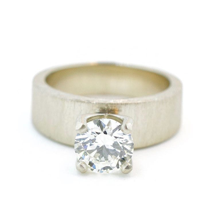 Brilliant Cut Diamond With Thick White Gold Band