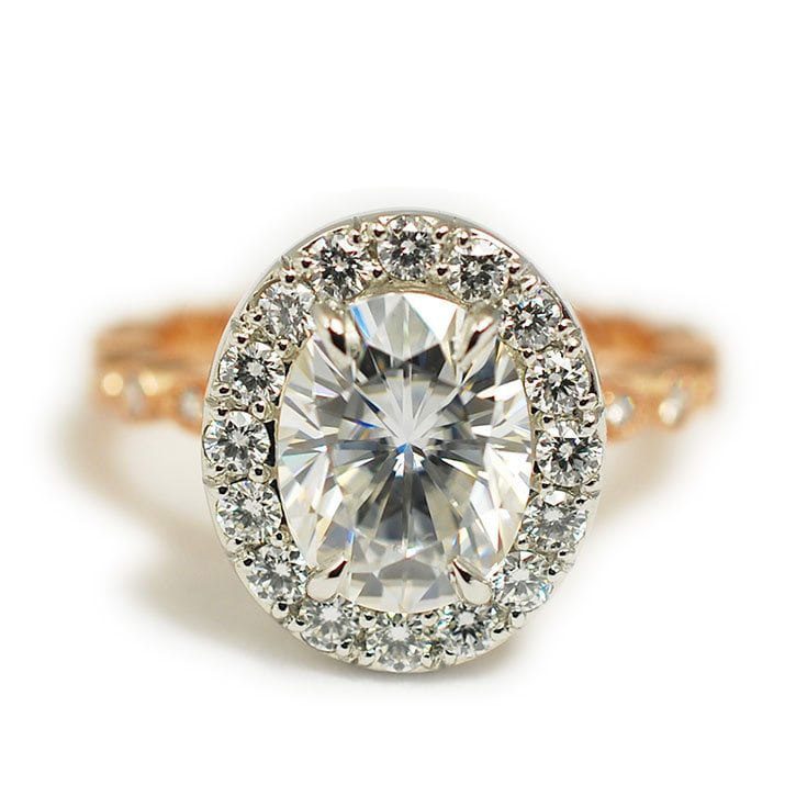 Platinum and Rose Gold Oval Halo Engagement Ring