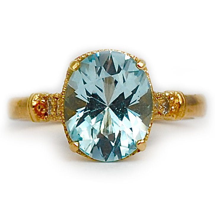 Yellow Gold Blue Topaz Oval Ring