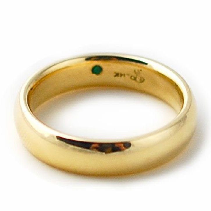 Classic Gold Band With Hidden Emerald Accent