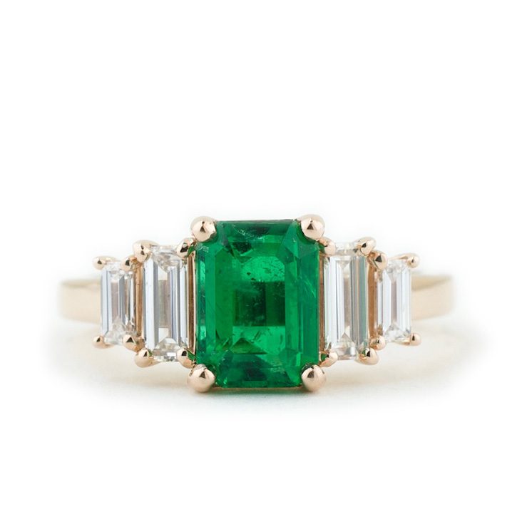 Colored engagement ring, emerald and diamonds, designed by Abby Sparks Jewelry.