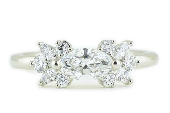 Custom engagement ring with floral marquise setting, designed by Abby Sparks Jewelry