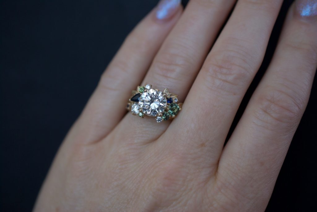 Custom made engagement ring with nature elements and inspiration.