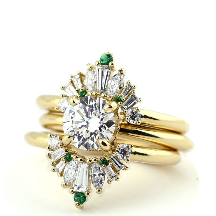 This 3-set diamond and emerald engagement ring fits together seamlessly and was designed by Abby Sparks Jewelry