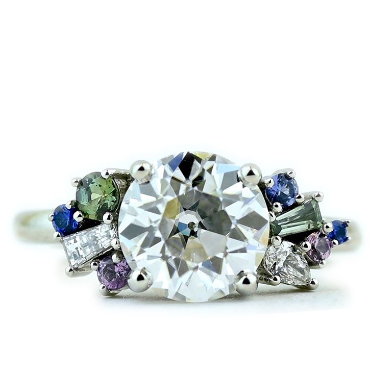 The Maggie, a stunning moissanite engagement ring with sapphire and alexandrite accents designed by Abby Sparks Jewelry.